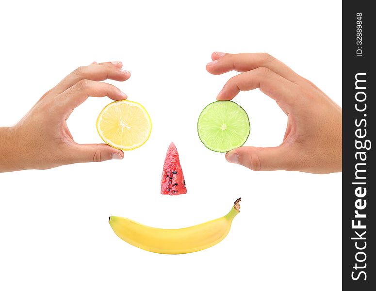 Little face made of fruit.. White background.