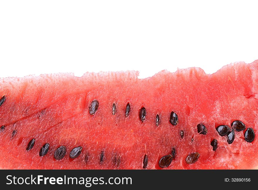 Detailed closeup of watermelon. White background is top.