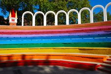 Rainbow Colored Benches Stock Photo