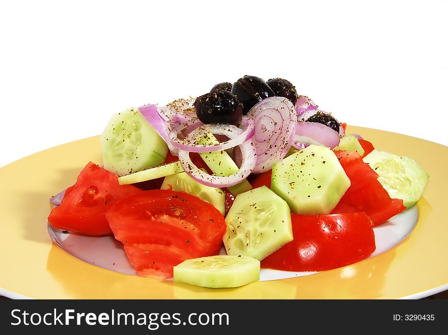 Fresh greek salad isolated on white background