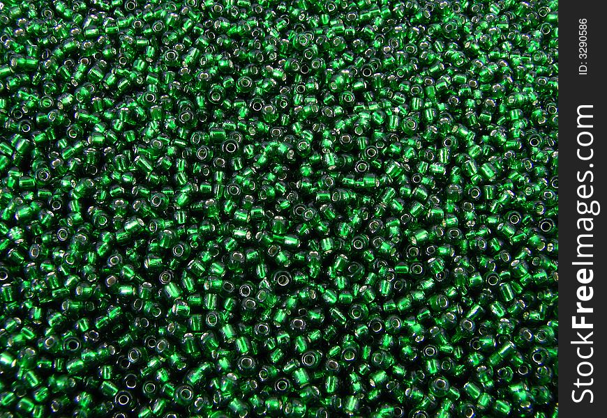 Abstract background of beads,
green colur beads. Abstract background of beads,
green colur beads