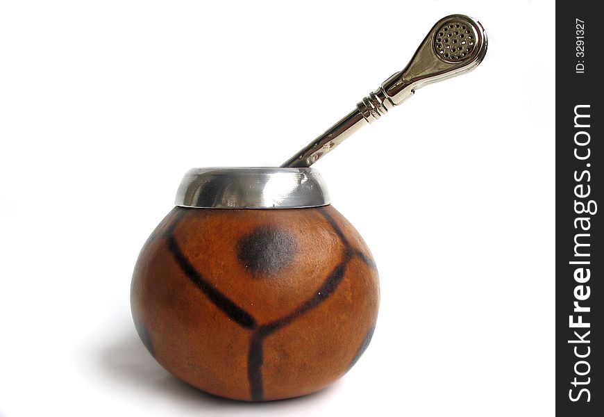 Сup from calabash with yerba mate tea and straw, traditional drink of Argentina