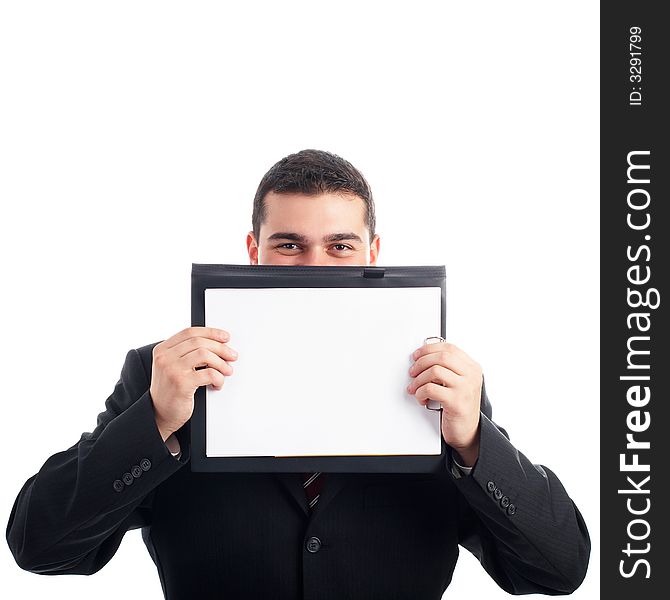 Businessman holding a blank paper on clipboard in front of his face - isolated on white. Businessman holding a blank paper on clipboard in front of his face - isolated on white