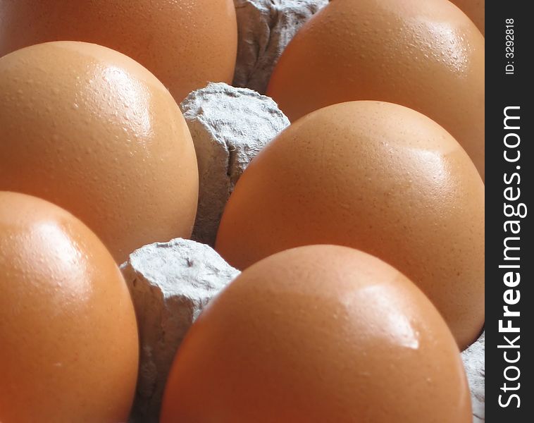 A close-up of brown eggs, fresh from the farm. A close-up of brown eggs, fresh from the farm