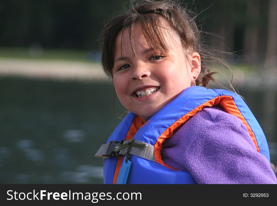 Happy little girl having fun on a boat. Happy little girl having fun on a boat