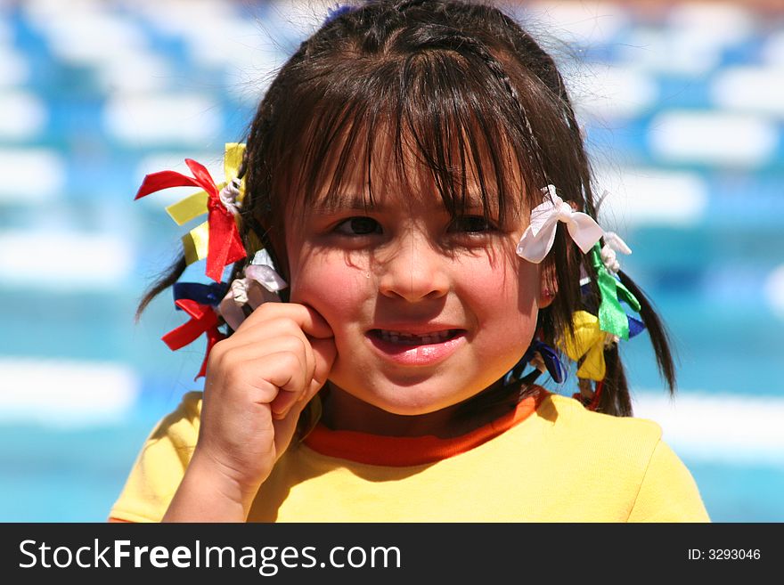 Smiling girl at the pool