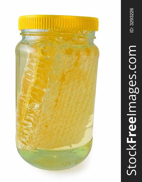 A chunk of acacia honeycomb in clear acacia honey. A chunk of acacia honeycomb in clear acacia honey.
