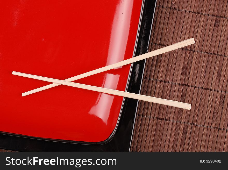 Chopsticks And Red Plate