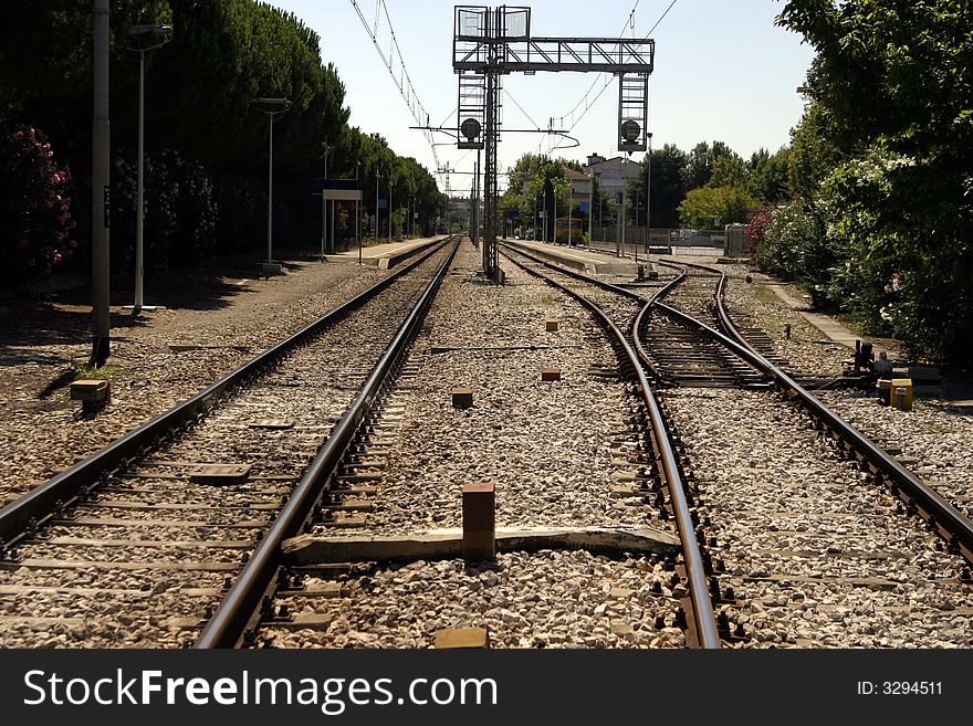 Railway rails and station in Italy