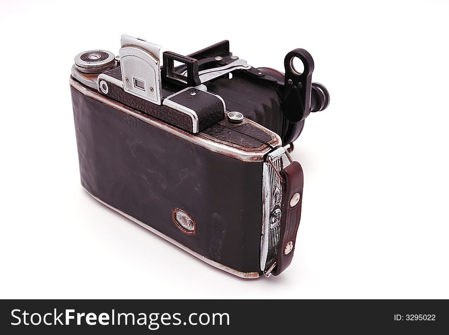 Old roll-film camera isolated on white