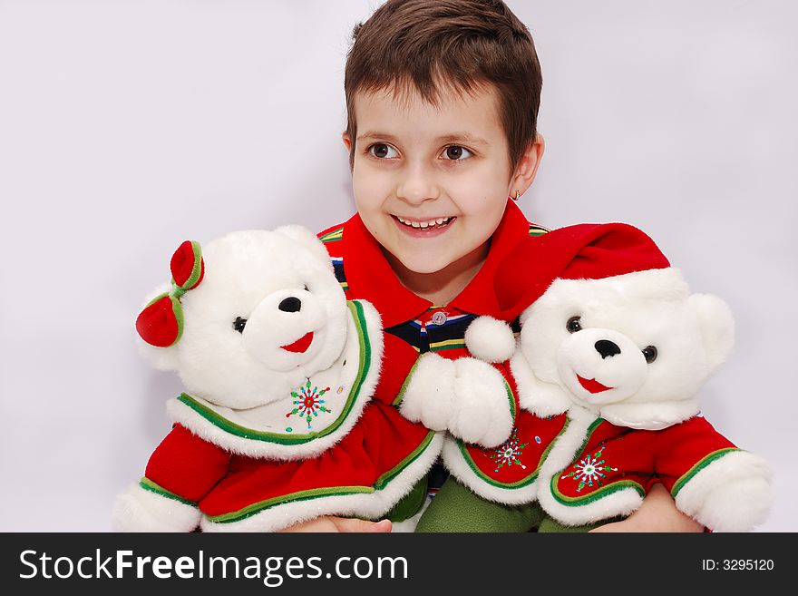 Funny child with christmas bears