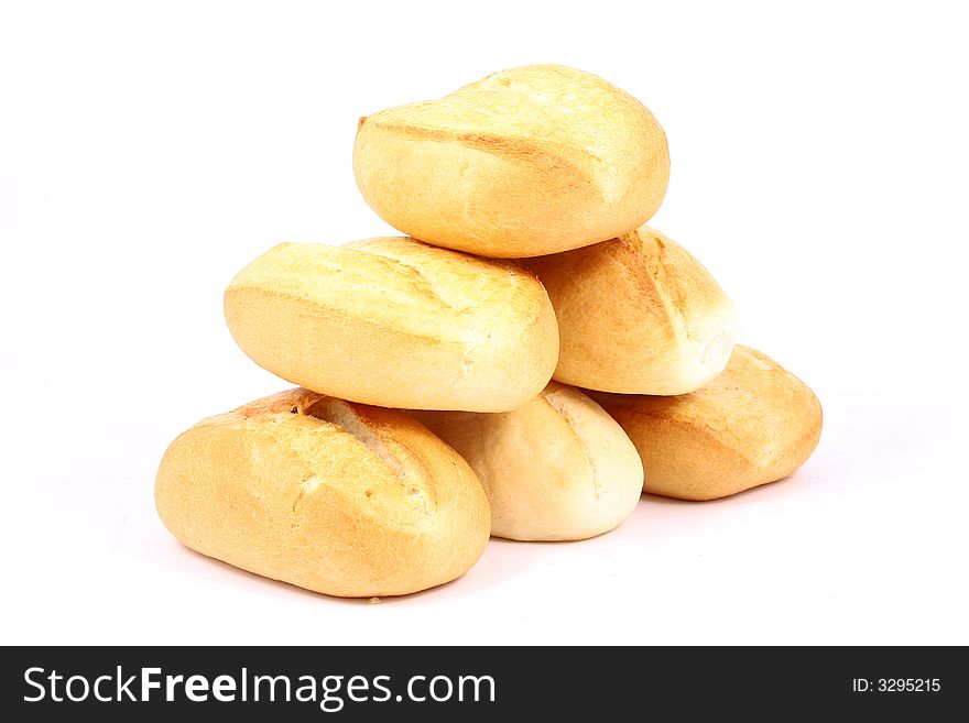 A breakfast tray with fresh bread and roll