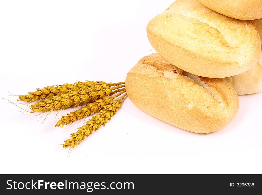 A breakfast tray with fresh bread and roll