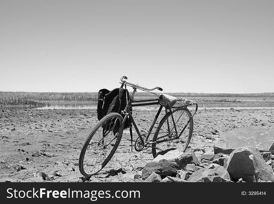 Old bike in a desert in Bolivia