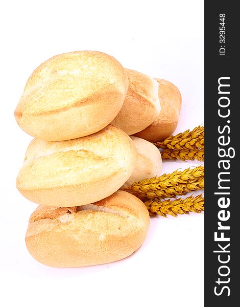 A breakfast tray with fresh bread and roll