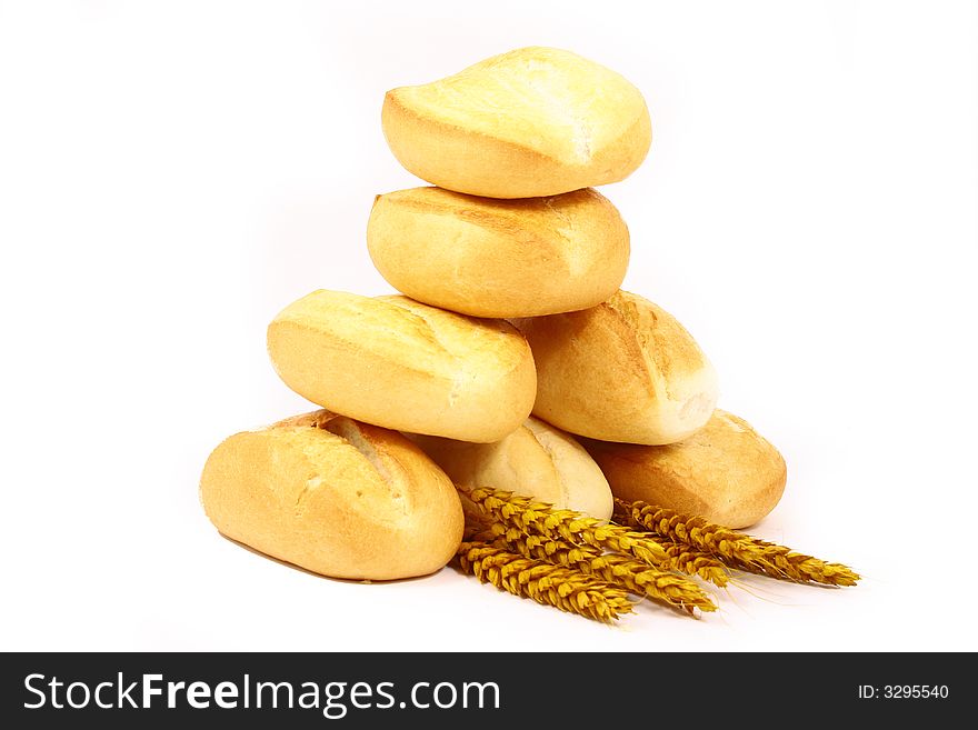 A breakfast tray with fresh bread and roll