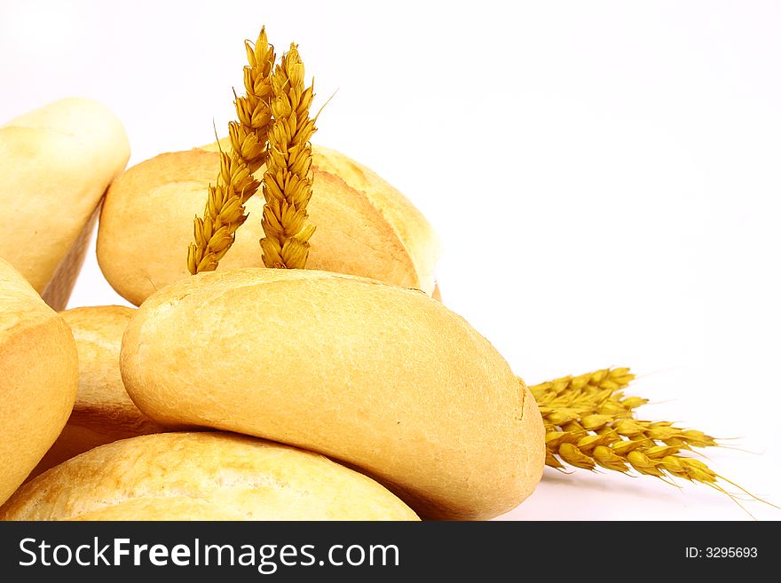 A breakfast tray with fresh bread and roll