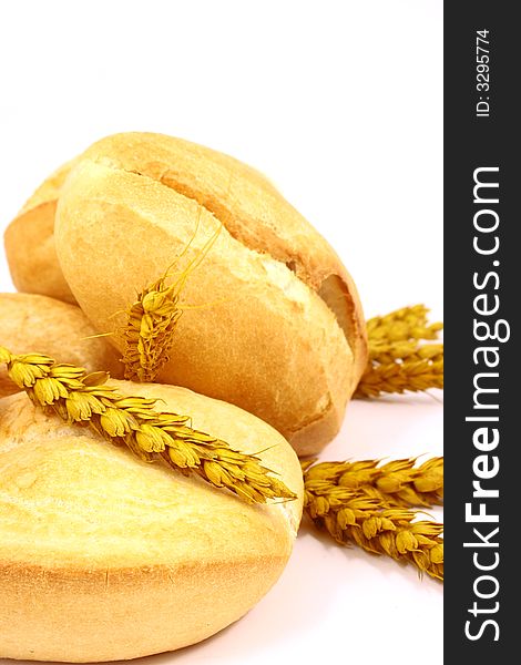 A breakfast tray with fresh bread and roll