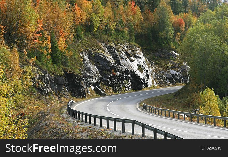 Highway on the Norwegian/Swedish border in Storlien at fall. Highway on the Norwegian/Swedish border in Storlien at fall