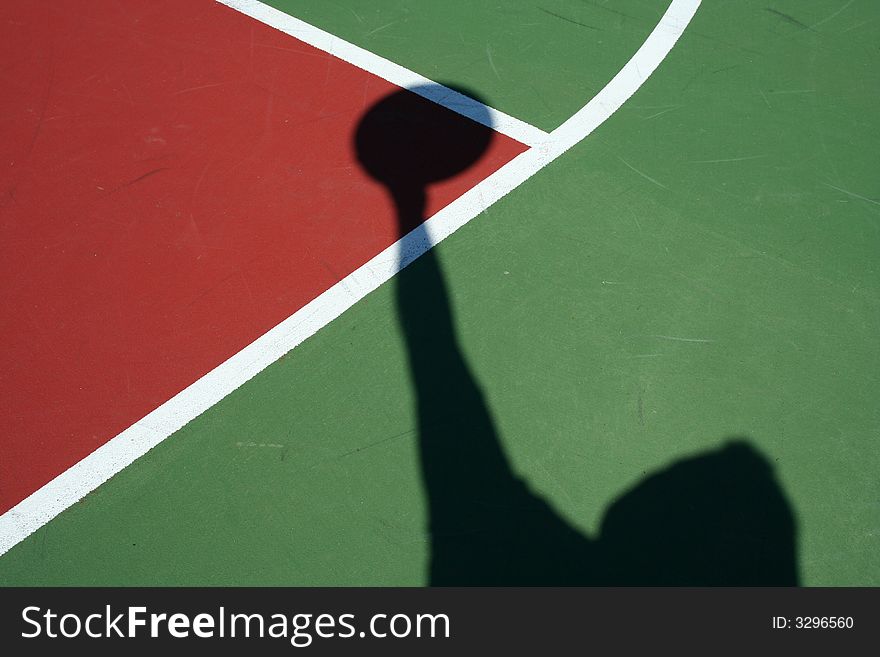 A Shadow Basketball player in the key