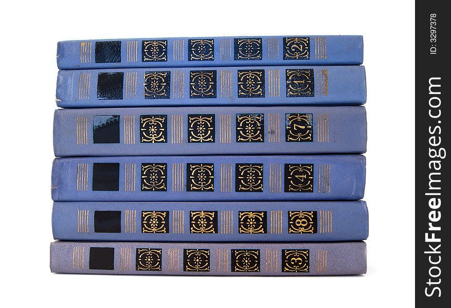 Stack of violet books over white background