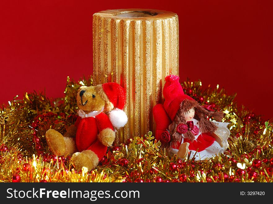 Golden candle and christmas decoration. Golden candle and christmas decoration