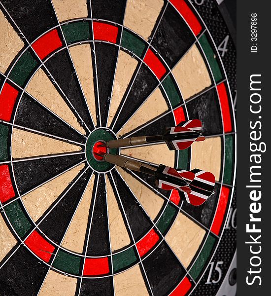 Three darts in a dartboard