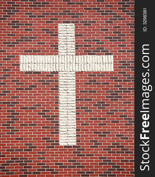 Red Brick Cross on the Side of a Church