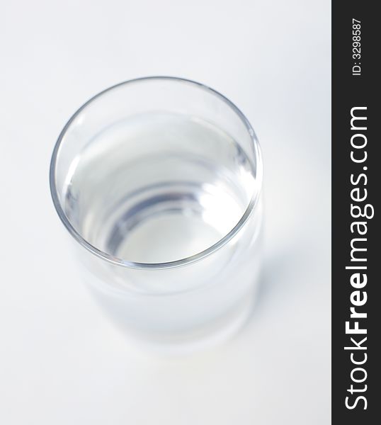 A single Glass of water against white background