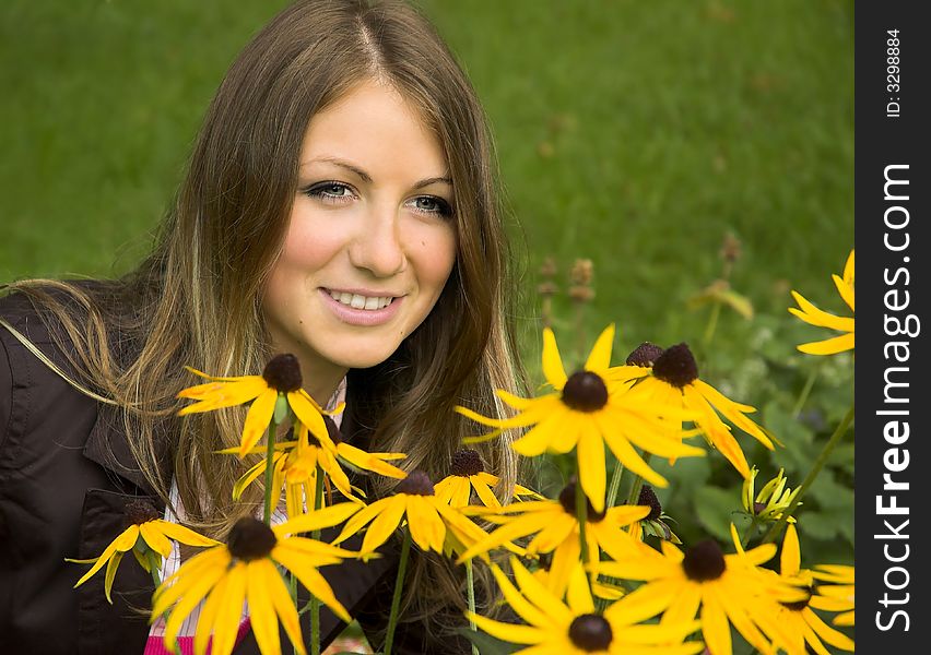 The girl close up among yellow colors. The girl close up among yellow colors