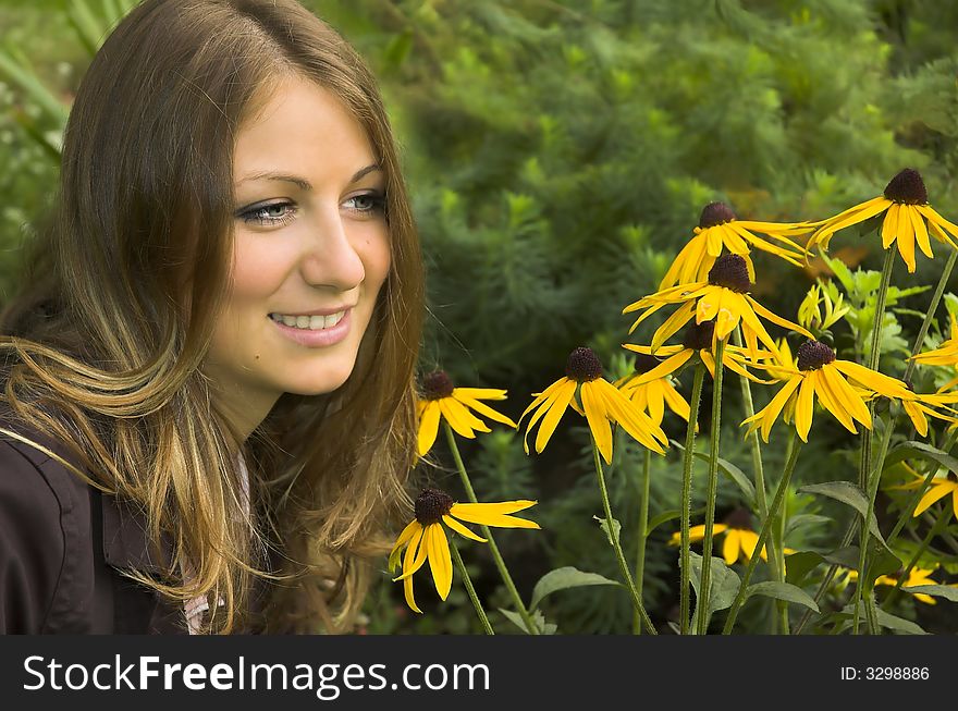 The girl close up among yellow colors. The girl close up among yellow colors