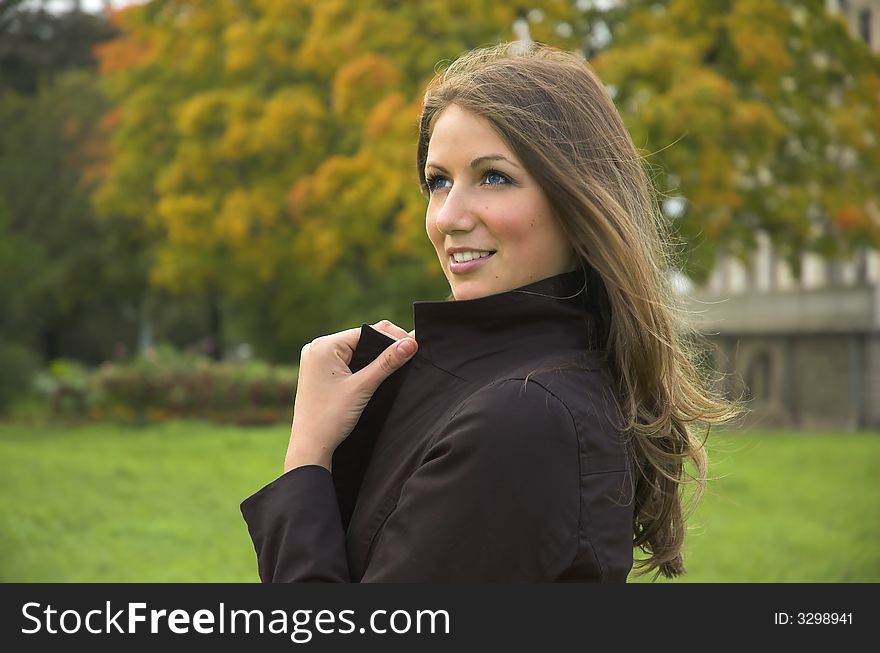 Portrait of the beautiful girl in autumn park. Portrait of the beautiful girl in autumn park