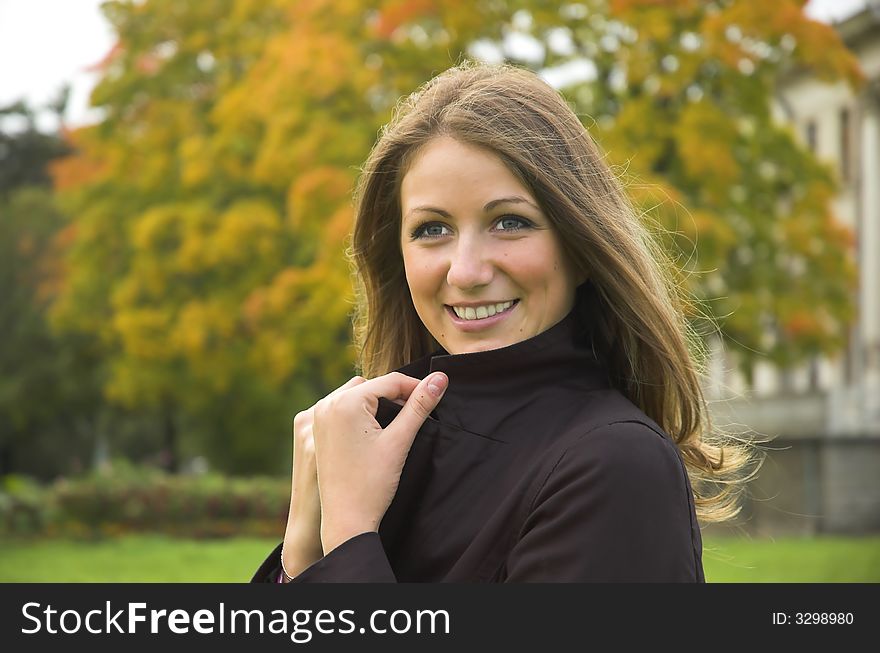 Portrait of the beautiful girl in autumn park. Portrait of the beautiful girl in autumn park