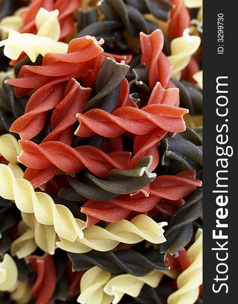 Uncooked dried Fusili tricolore pasta shells