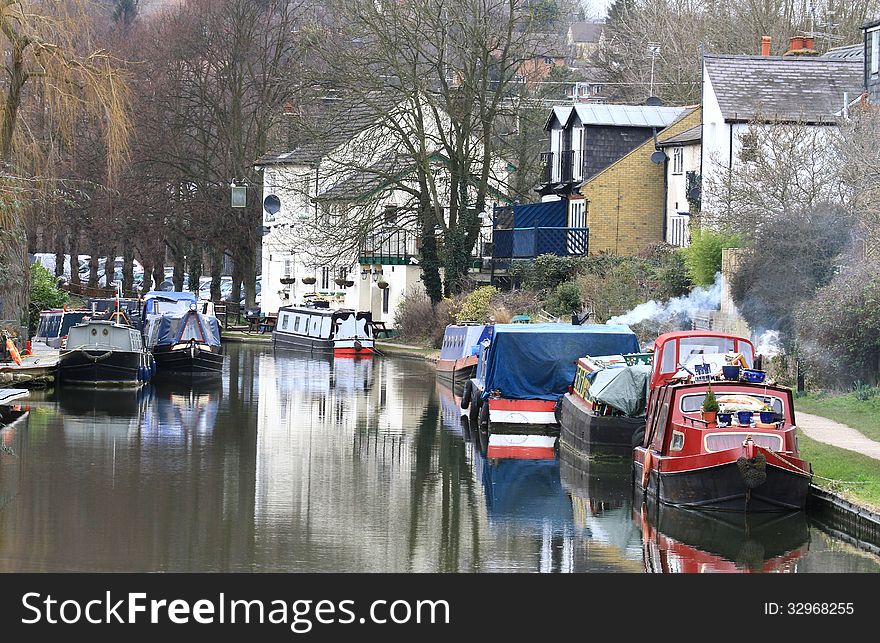 Image of boat-homes on a canal in the UK