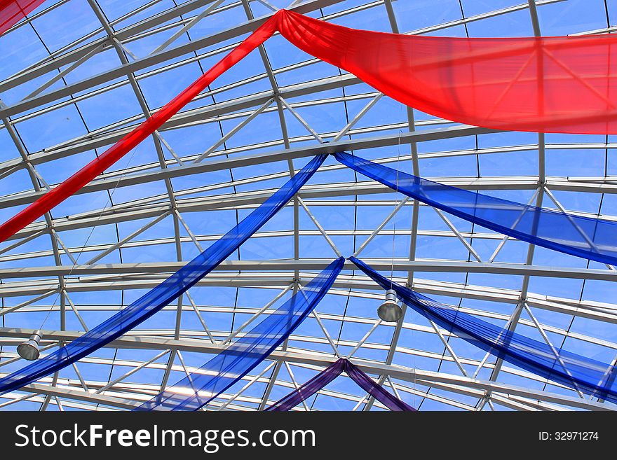 Roof dight with colored red and blue scarves