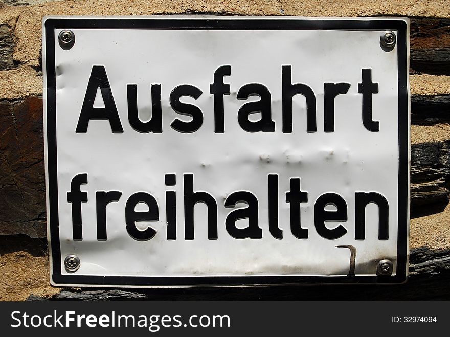 German sign: keep access for vehicles clear. German sign: keep access for vehicles clear.