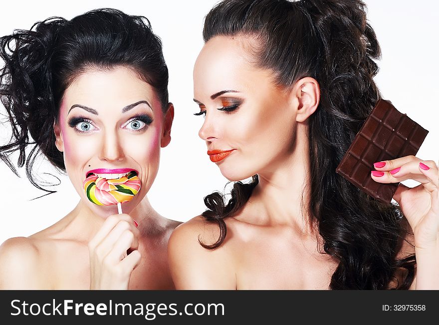 Glam. Couple Of Funny Women Holding Sweets. Positive Emotions. Vitality