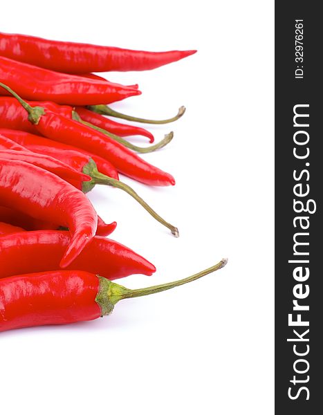 Frame of Ripe Red Chili Peppers isolated on white background