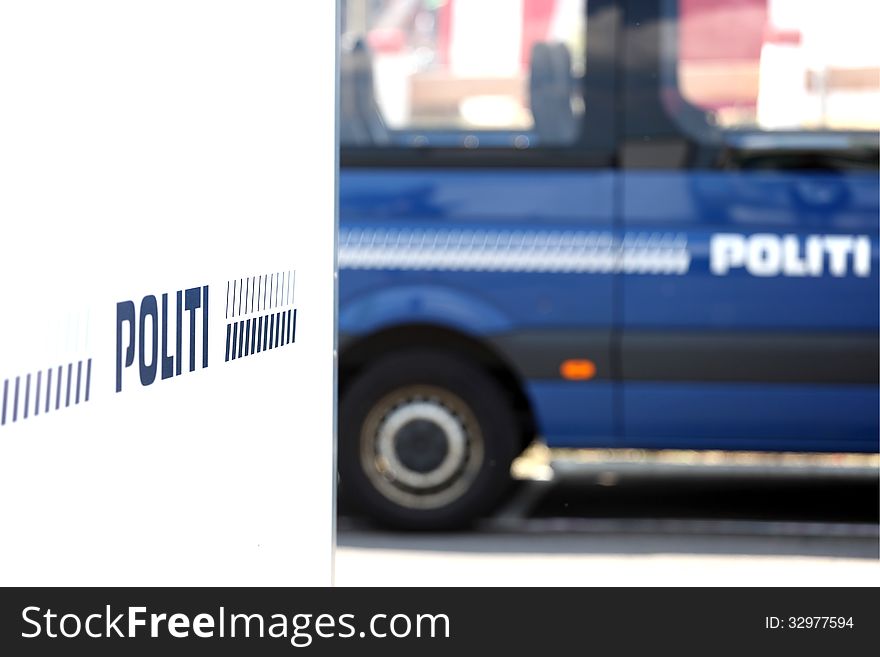 Police sign and police personnel carrier. Denmark. Police sign and police personnel carrier. Denmark.
