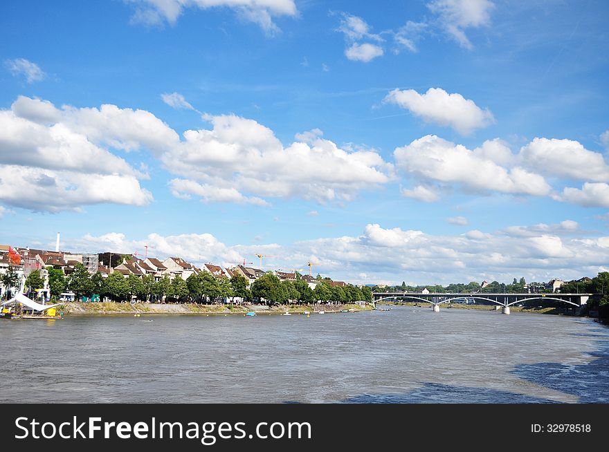 This shot is taken overlooking the River Rhine from one of the many bridges in Basel. This shot is taken overlooking the River Rhine from one of the many bridges in Basel.