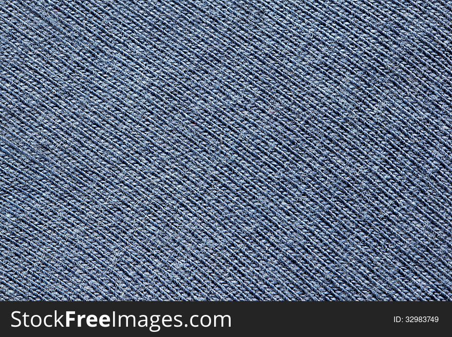 Close up view of dark blue knitten fabric texture. Abstract background. Close up view of dark blue knitten fabric texture. Abstract background.