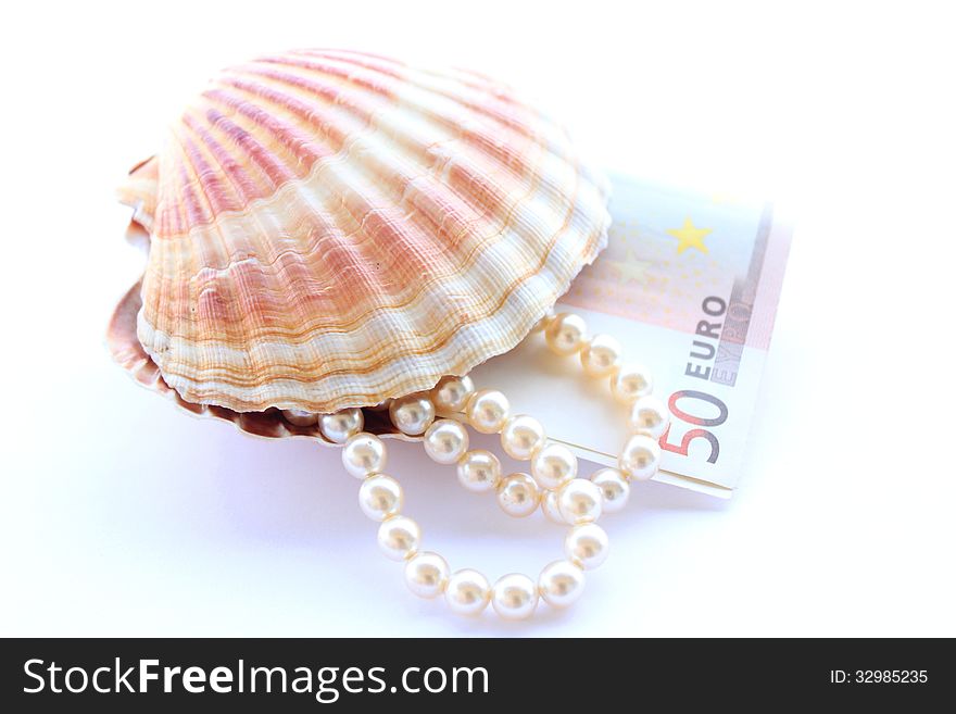 Luxury pearls and seashell and fifty euro. Luxury pearls and seashell and fifty euro