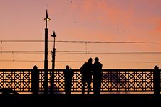 Couple Making Pictures On The Galata Bridge Royalty Free Stock Images