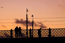 Galata Bridge In Istanbul At Sunset With People On The Bridge, P Royalty Free Stock Photo