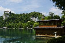 Beautiful Boathouse On Bled Lake With Bled Castle In The Background Stock Photography Beautiful Boathouse On Bled Lake With Bled Castle In The Background Stock Photography