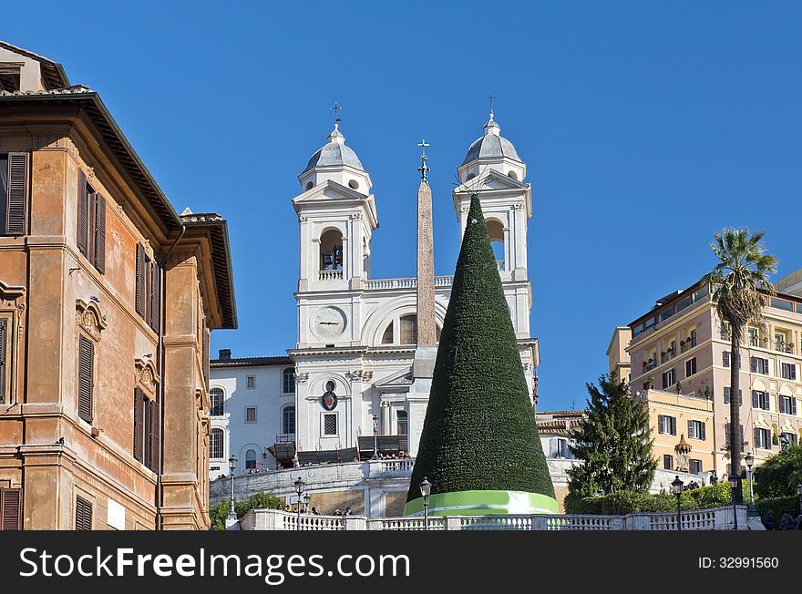 Christmas tree, obelisk and church on top of the spanish steps in Rome, Italy. Christmas tree, obelisk and church on top of the spanish steps in Rome, Italy