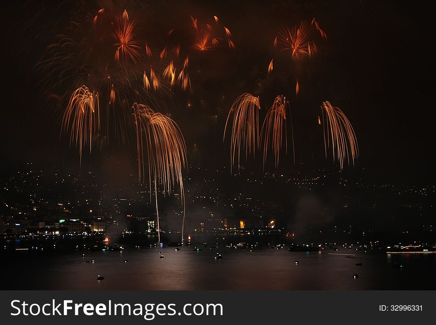 Fireworks show on the shore of the Lake of Lugano (Italian Switzerland)