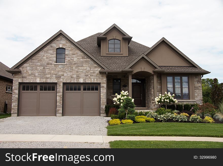 Stucco stone house with pretty garden and grass version 2. Stucco stone house with pretty garden and grass version 2.