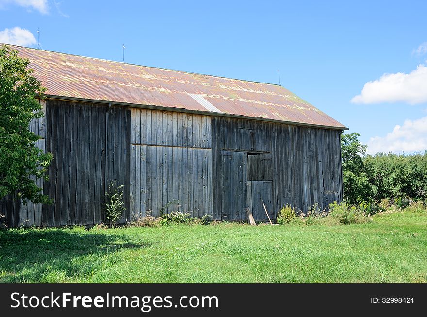 Traditional barn under blue sky